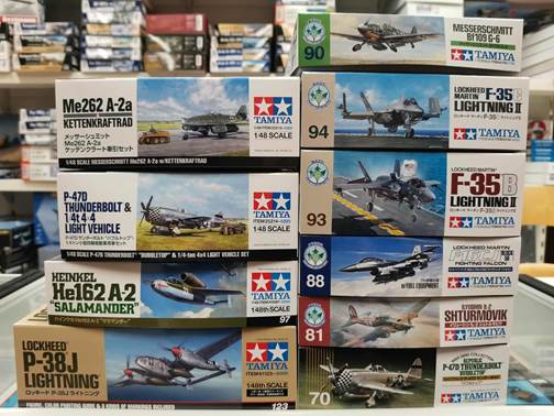 A stack of boxes with pictures of airplanes

AI-generated content may be incorrect.