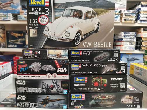 A stack of model building boxes

AI-generated content may be incorrect.