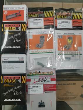 A group of packages of brass

AI-generated content may be incorrect.